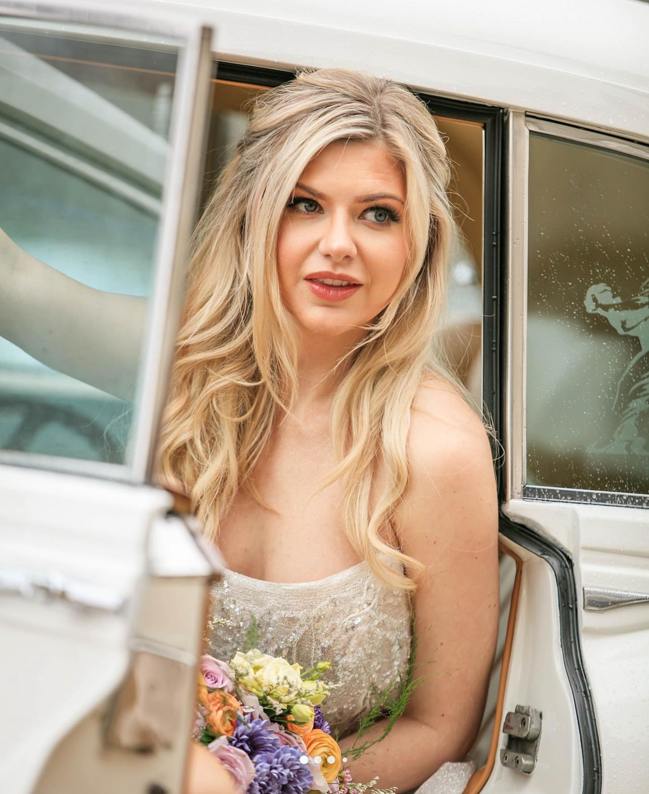 Bridal hair and makeup — bride with bouquet